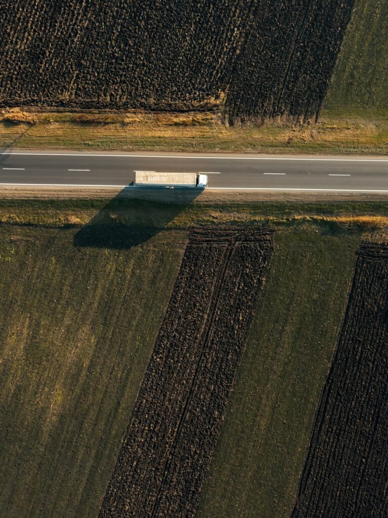 Aerial view of freight transportation truck on the road